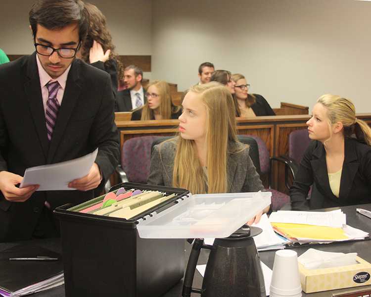 Last+years+mock+trial+team+competed+in+the+Regional+Tournament+during+early+February.+Pictured+are+Cameron+Mirhossaini%2C+12%2C+Imma+Honkanen%2C+12%2C+and+former+student+Katelyn+Soulier.