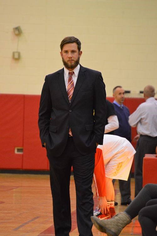Coronado mens basketball coach Dave Thomas paces the sidelines during the Cougars game against Pine Creek on 1/15. 