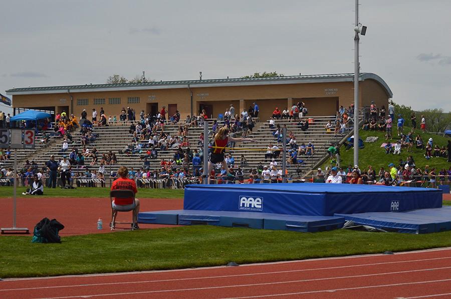 Junior Celia Smith high jumps at the 2014-2015 Colorado State State Track Meet.