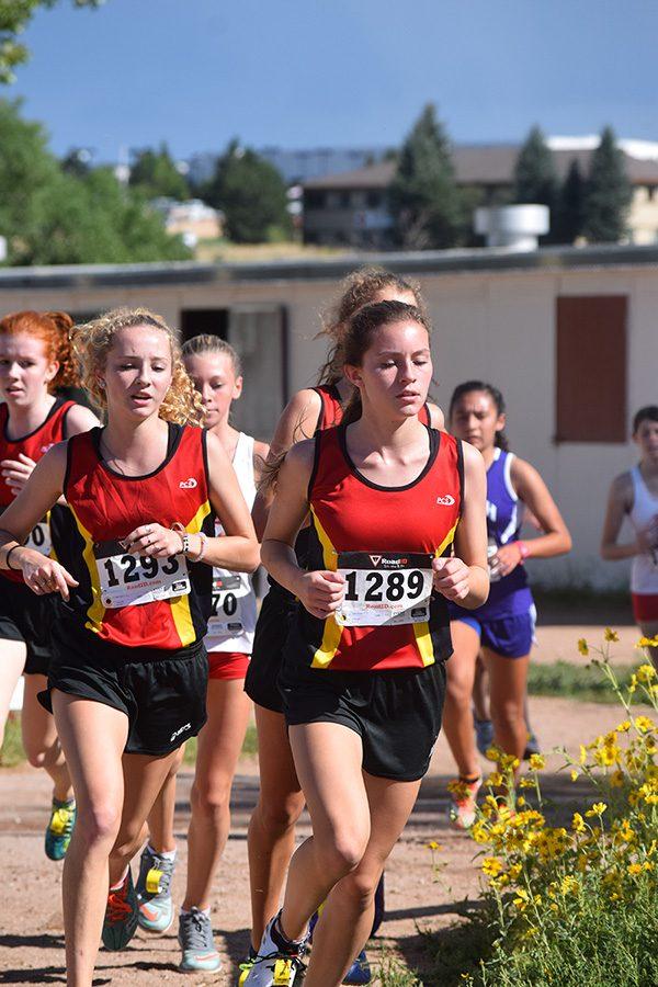 The Cougars run at the Cheyenne Mountain Stampede in late August. 