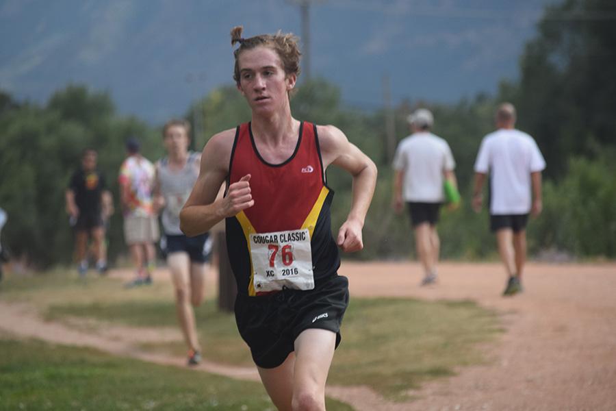 Junior Conor Strizich's running talent is as rare as the unicorn his hair takes after...but becoming less rare is the look as young teammate Charlie Schroeder has adopted the 'aerodynamic' look, as well.