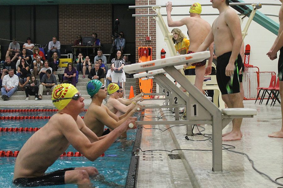 Backstrokers take to the water at the first home meet against Doherty  