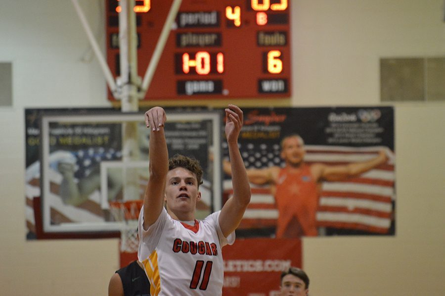 Mens basketball returner Kaddin Standley, 12. shoots a free-throw during the 2016-2017 season.