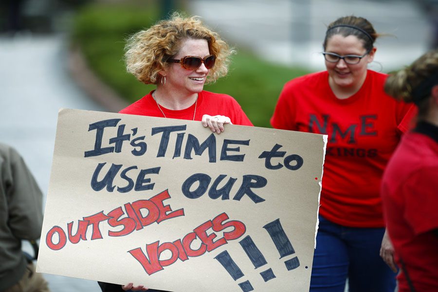 Elizabeth Garlick, a teacher at North Mor Elementary School in Northglenn, CO protests 