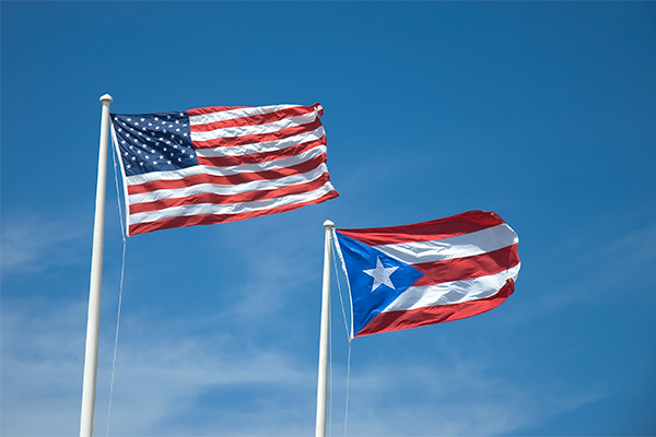 The American and Puerto Rican flags