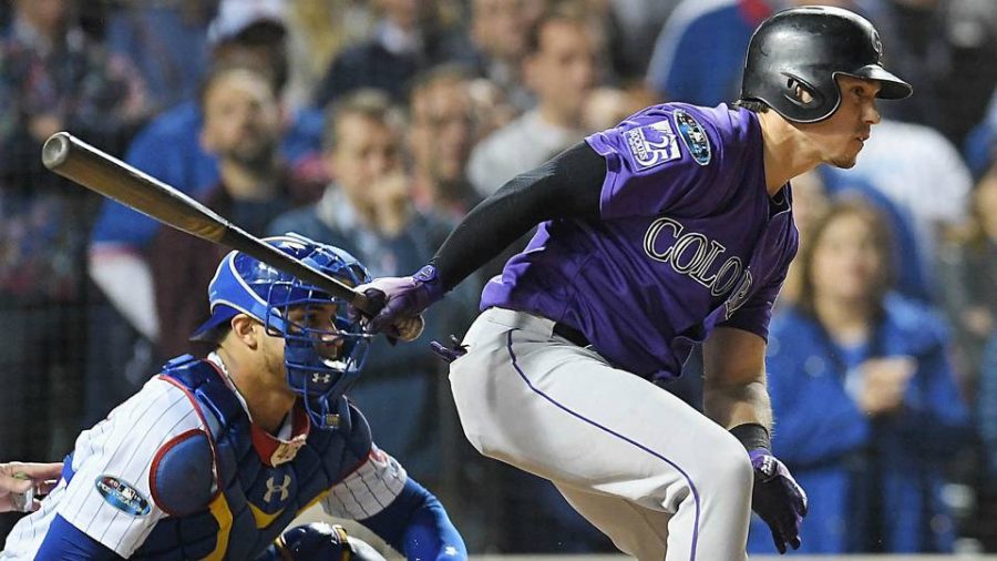 Tony Wolters sends a single into center to bring around the game winning run.