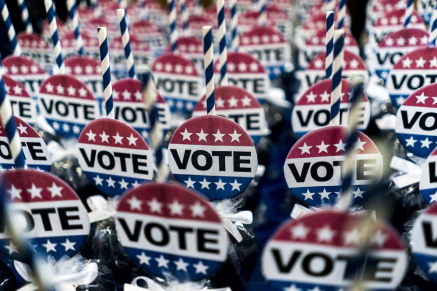 COVINGTON, GEORGIA - Supporters sell vote pins during a Stacey Abrams for Georgia Governor rally in Covington, Georgia Friday October 26, 2018. (Photo by Melina Mara/The Washington Post via Getty Images)