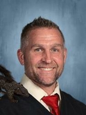 Mr. Stoughtons Pet Squirrel Makes an Appearance on Staff Photo Day