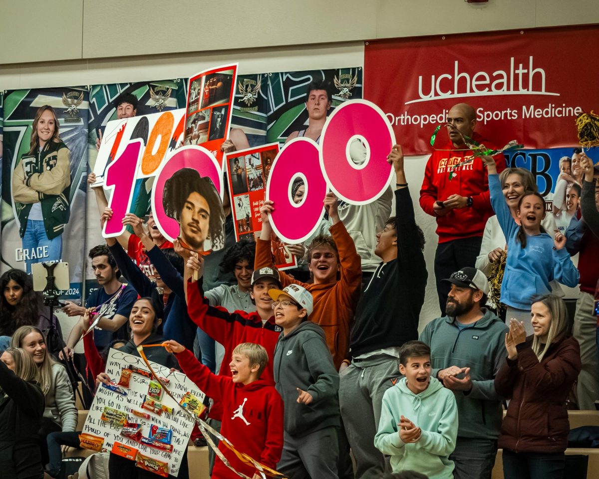 Coronado Students and Parents celebrating Realiti Smith’s 1,000th career point at Falcon High School